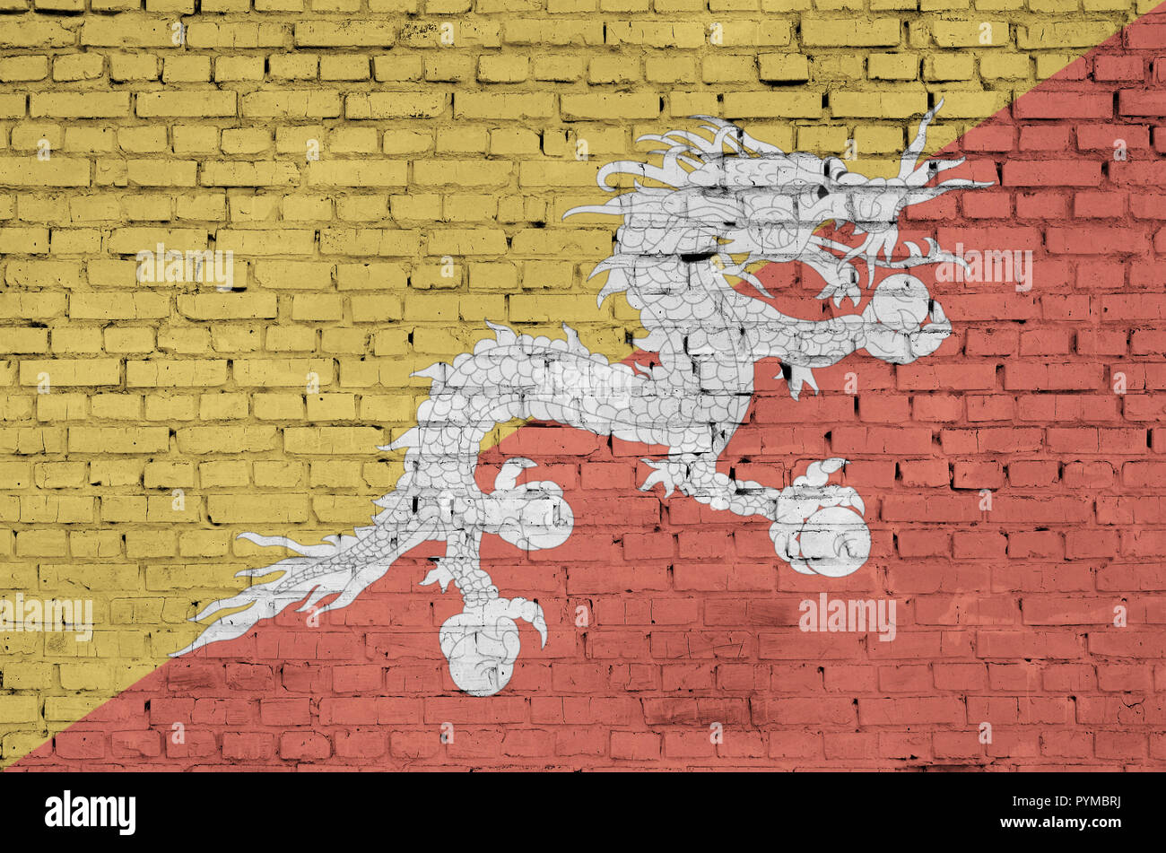 Bhutan flag is painted onto an old brick wall Stock Photo - Alamy