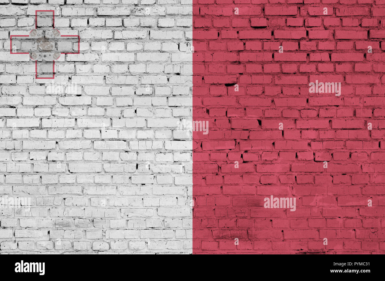 Malta flag is painted onto an old brick wall Stock Photo - Alamy