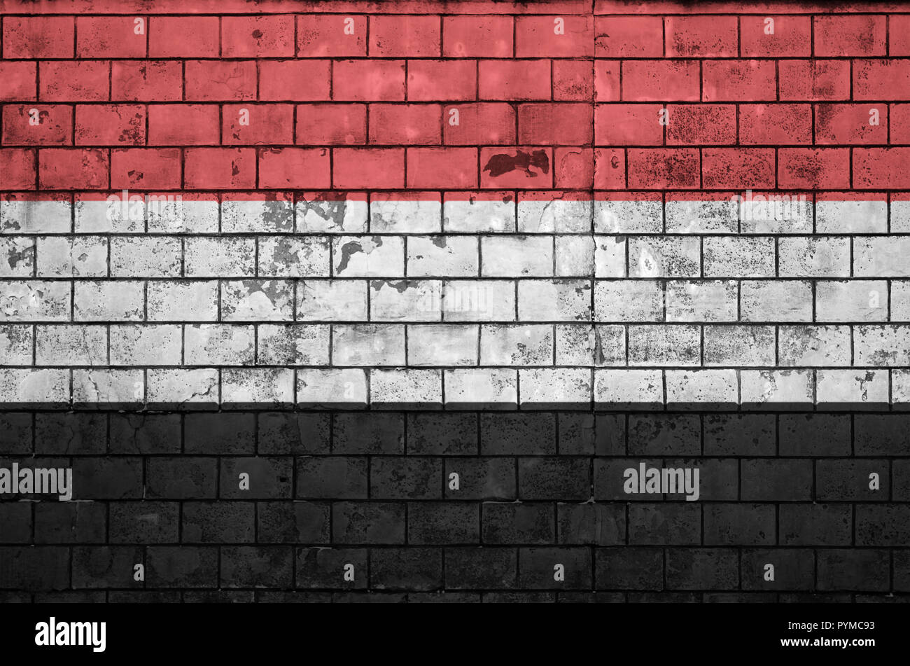 Yemen flag is painted onto an old brick wall Stock Photo - Alamy