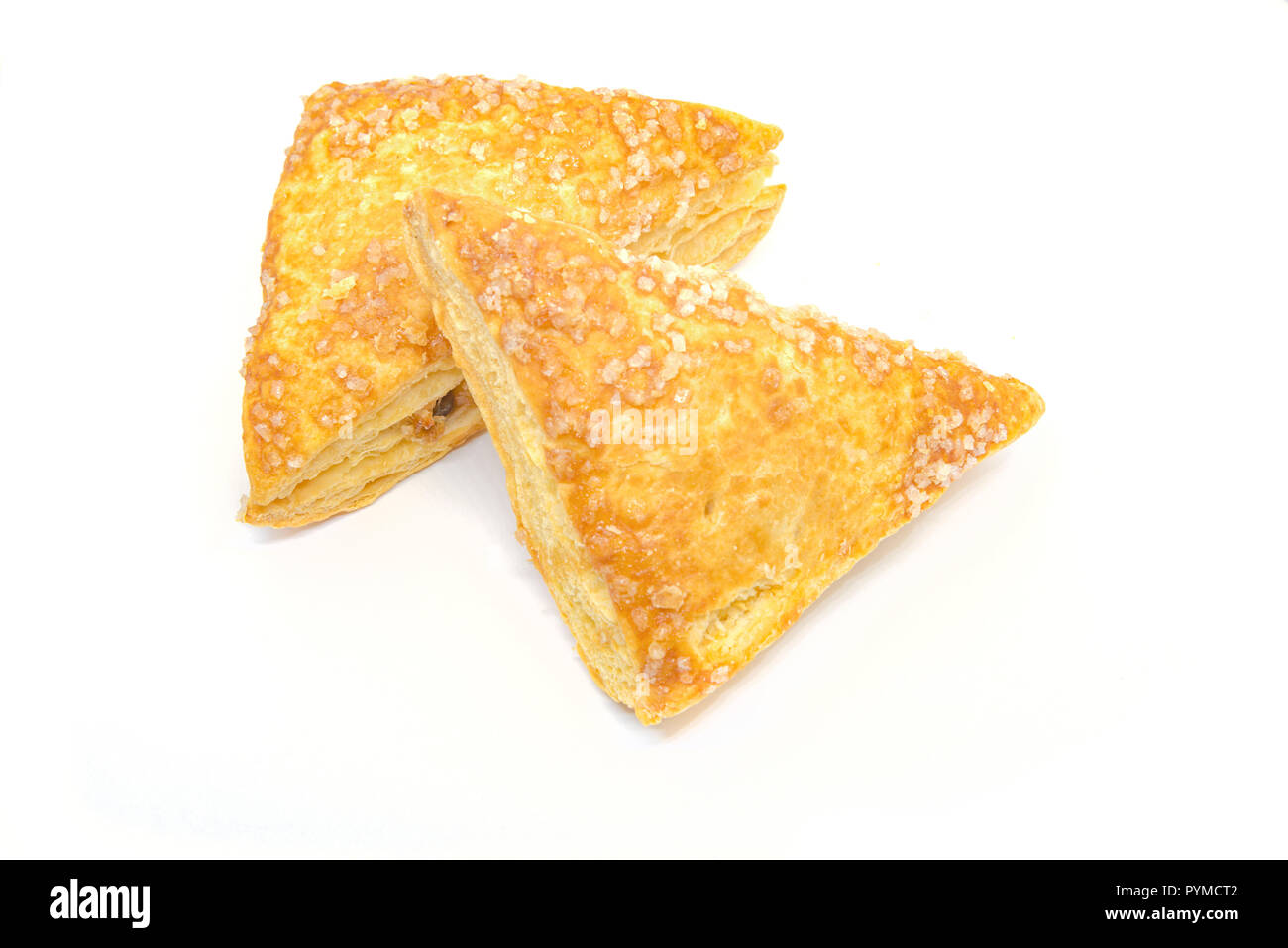 Two crispy apple pies isolated on white background Stock Photo