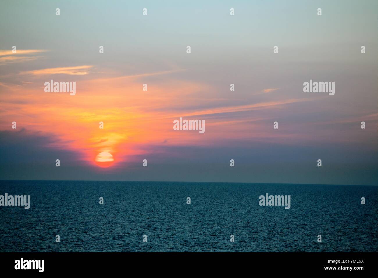 SETTING SUN OVER THE NORTH SEA Stock Photo