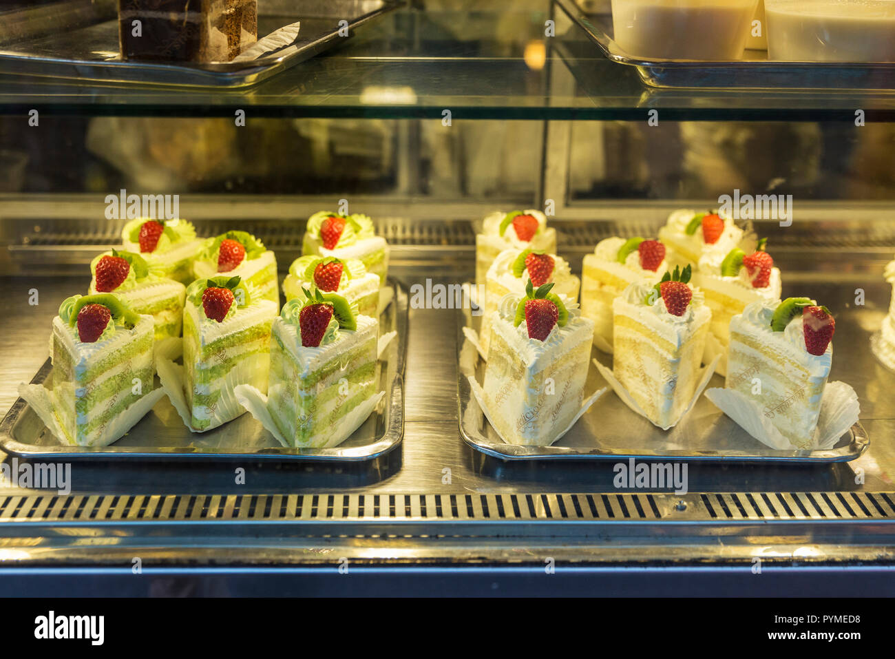Cream and raspberry cakes in a candy store in Chinatown in London