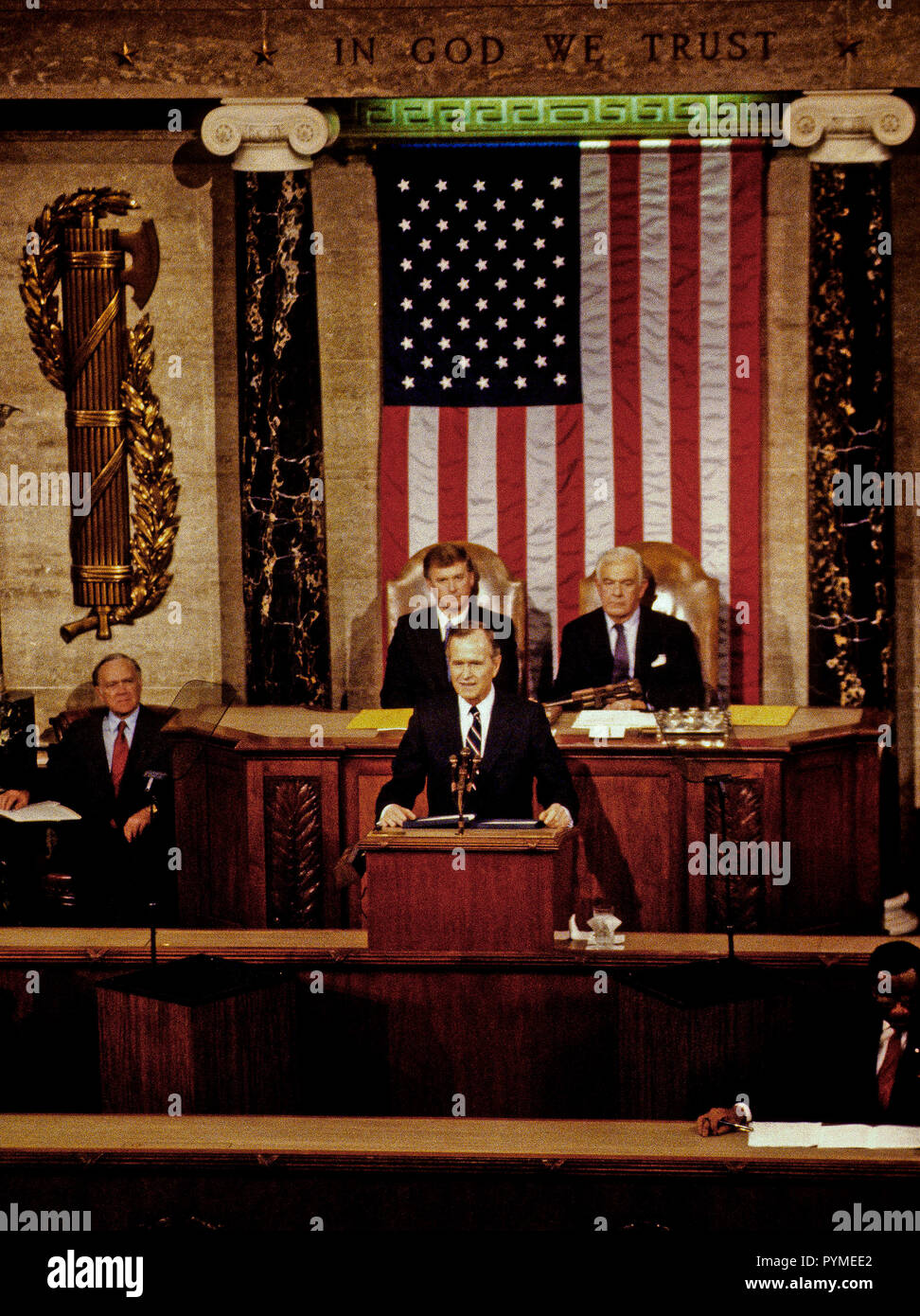 Washington DC., USA,  January 31, 1990. President George H.W. Bush delivers his first state of the union message to a joint session of Congress, seated behind are (l>r) Vice President Dan Quayle and Speaker of the House Thomas Foley Credit: Mark Reinstein/MediaPunch Stock Photo