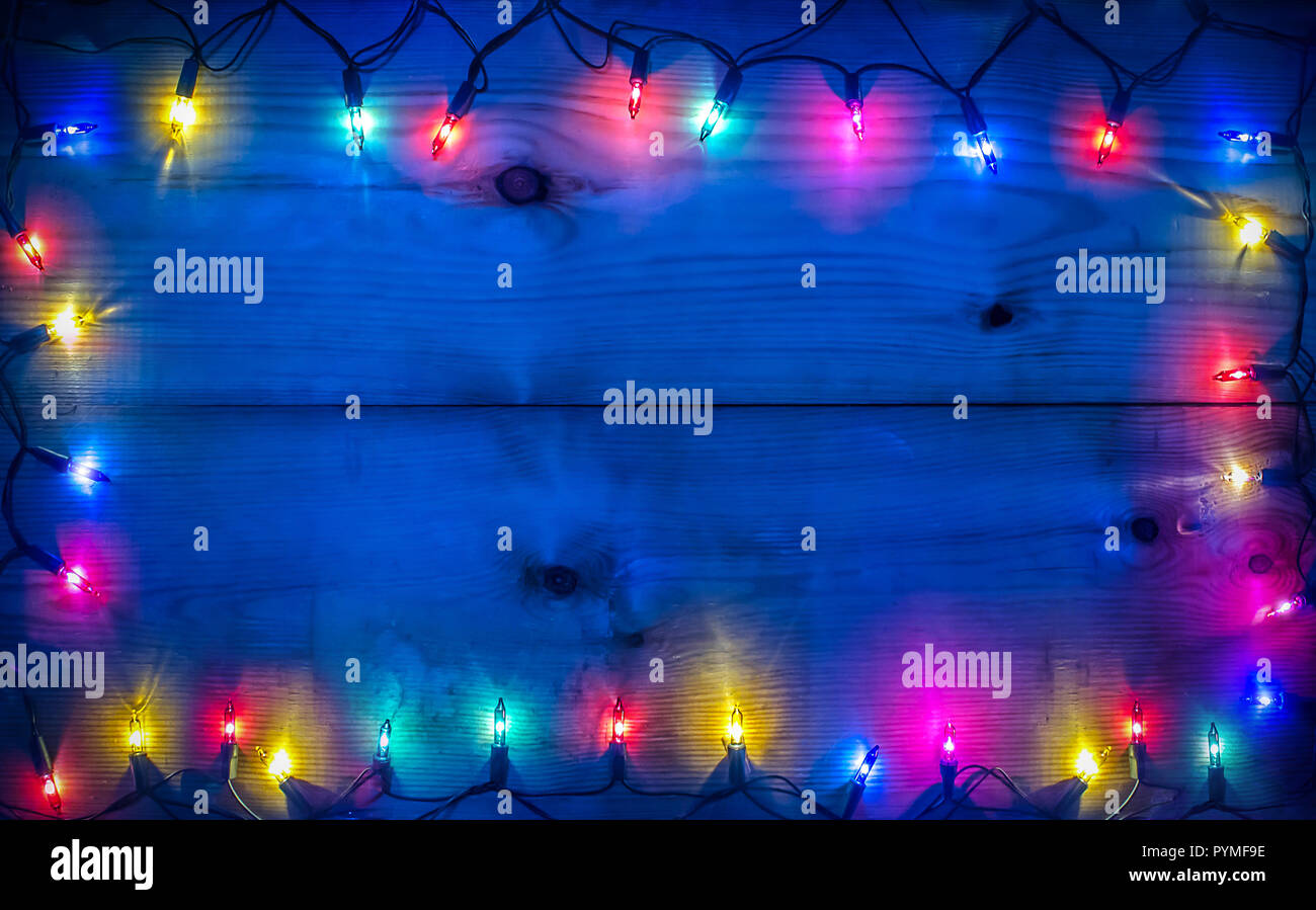 Christmas lights frame background. Empty space for text or draw Stock Photo