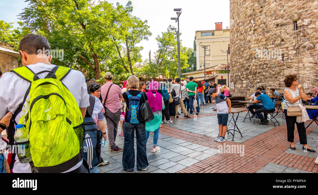 Istanbul, Turkey, September 2018: A long line of people waiting to climb the Galata Tower for the view of Istanbul. Stock Photo