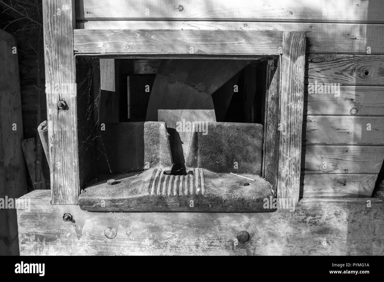 Antique wood splitter or chopper in an old Swedish farm in northern