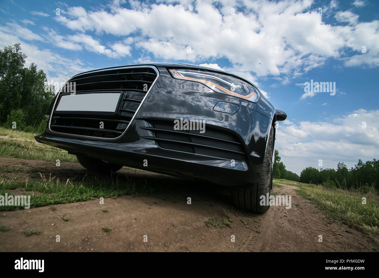 Dirt road with dark clouds on the horizon hi-res stock photography and ...