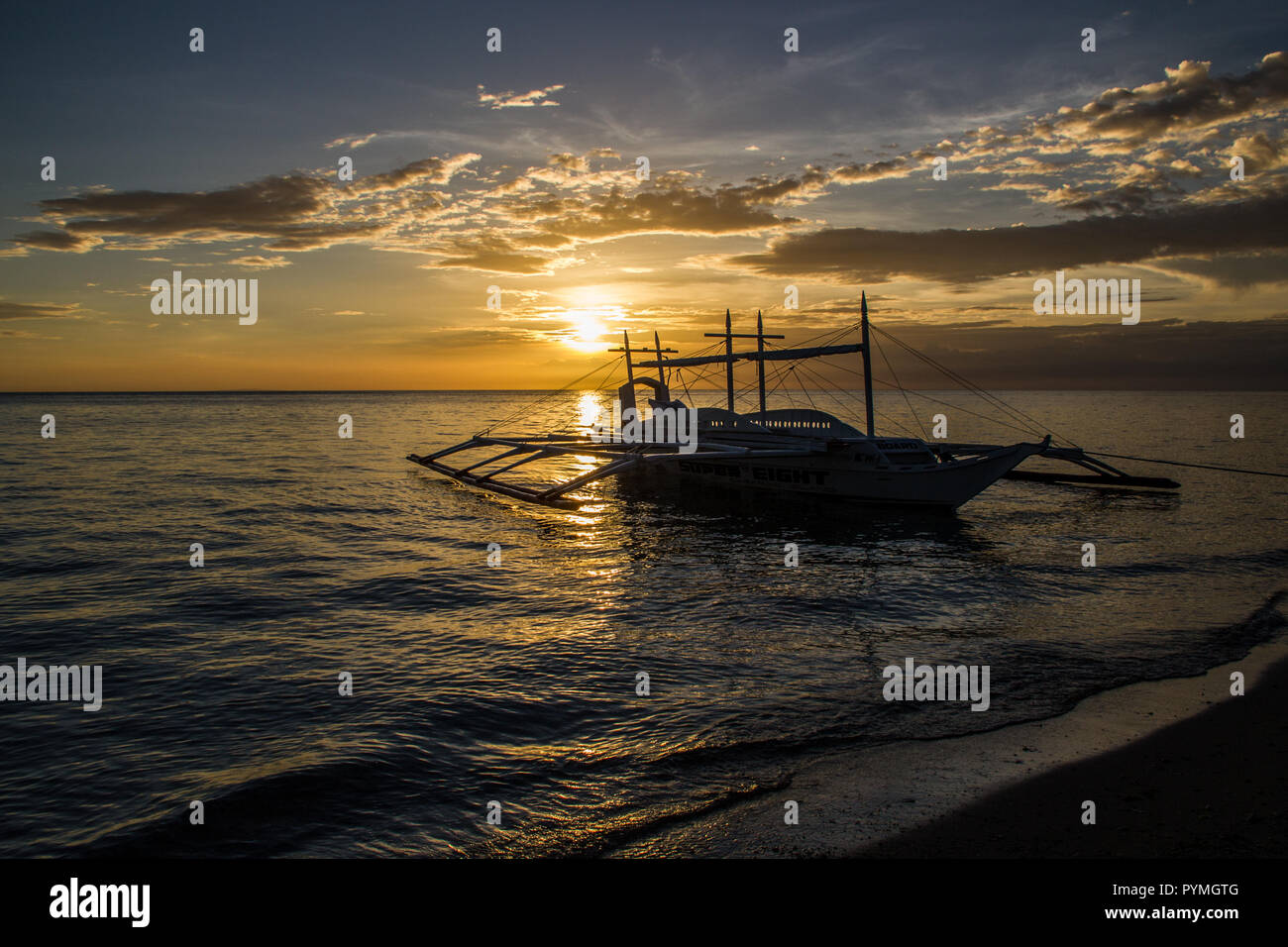 Carabao Island (Philippines) ,8 March 2018,Sunset and the boat Stock Photo