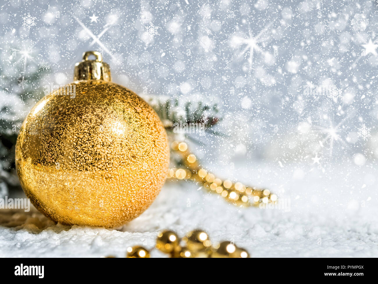 Christmas tree ball with fir branch, stars and snow Stock Photo - Alamy
