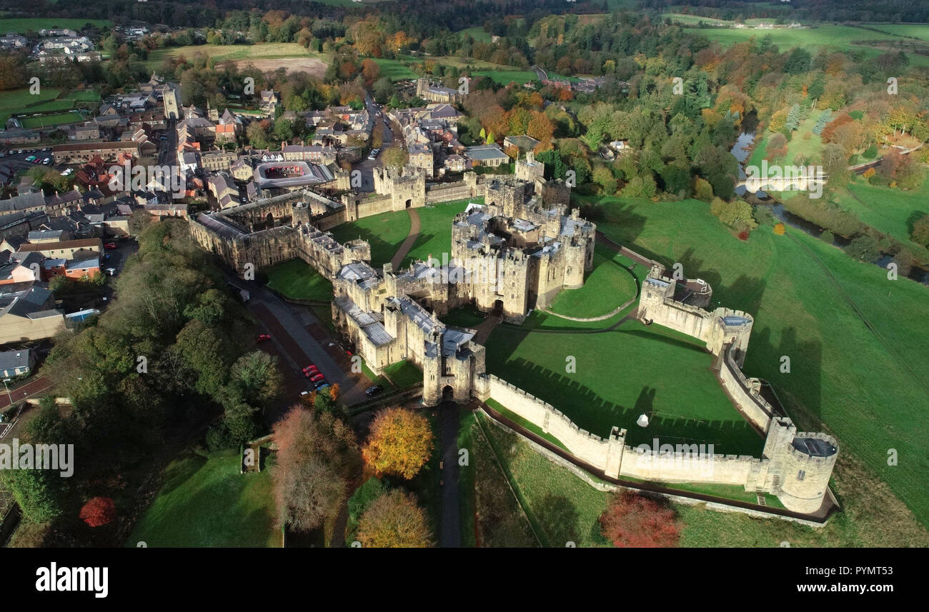An aerial view of a Alnwick Castle, Northumberland, surrounded by autumn colours. Stock Photo
