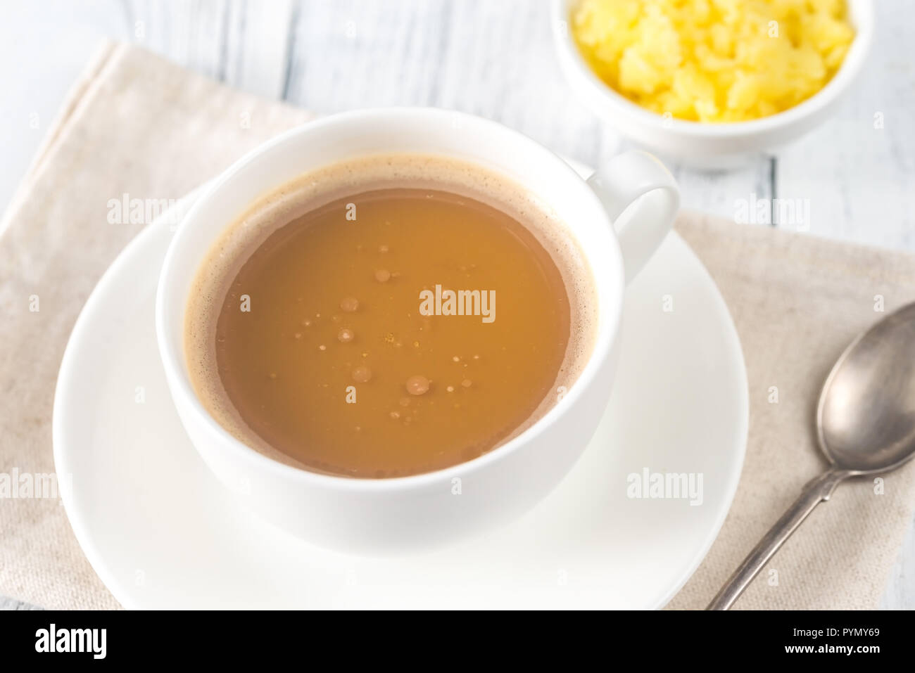 Cup of coffee with ghee butter Stock Photo Alamy