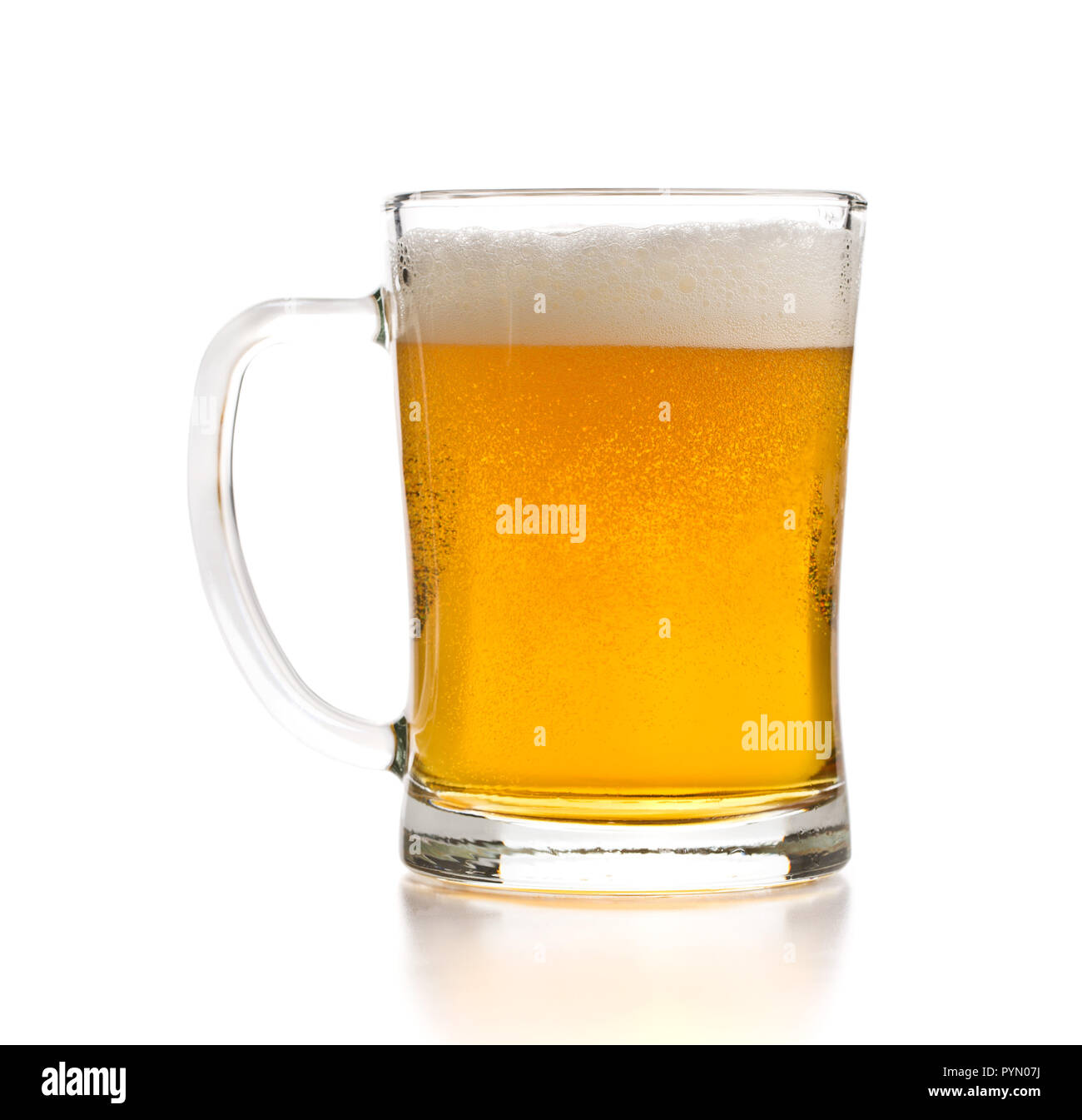 Glass of beer isolated on white background. Stock Photo