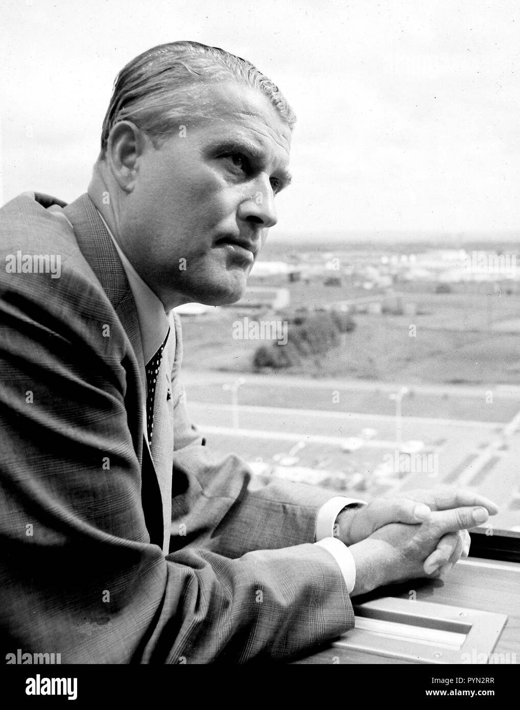 Dr. von Braun is looking out from a 10th floor window of building 4200 ...