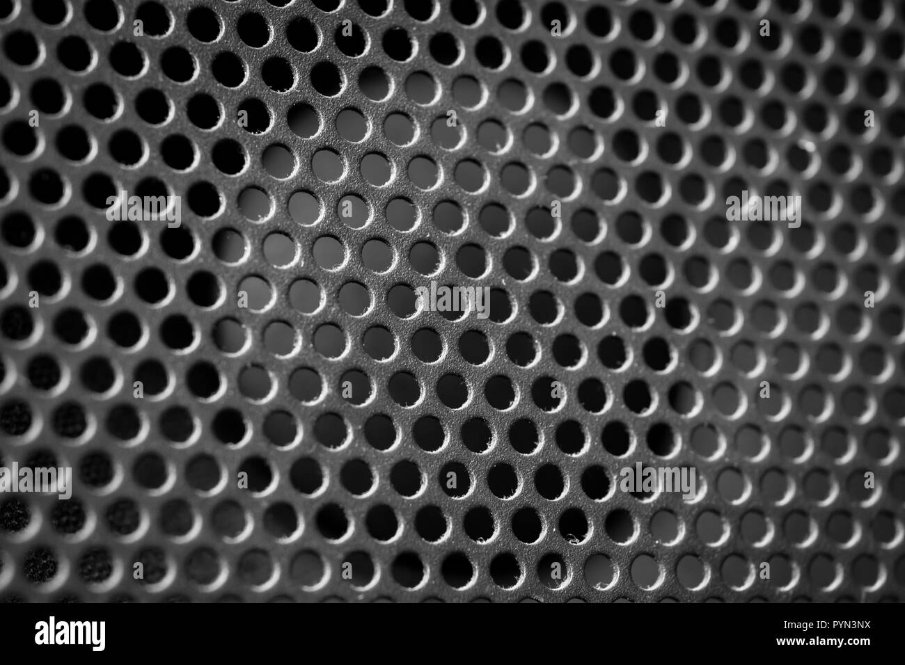 Audio Speaker Mesh Grille and sub speaker driver in backgroung Stock Photo
