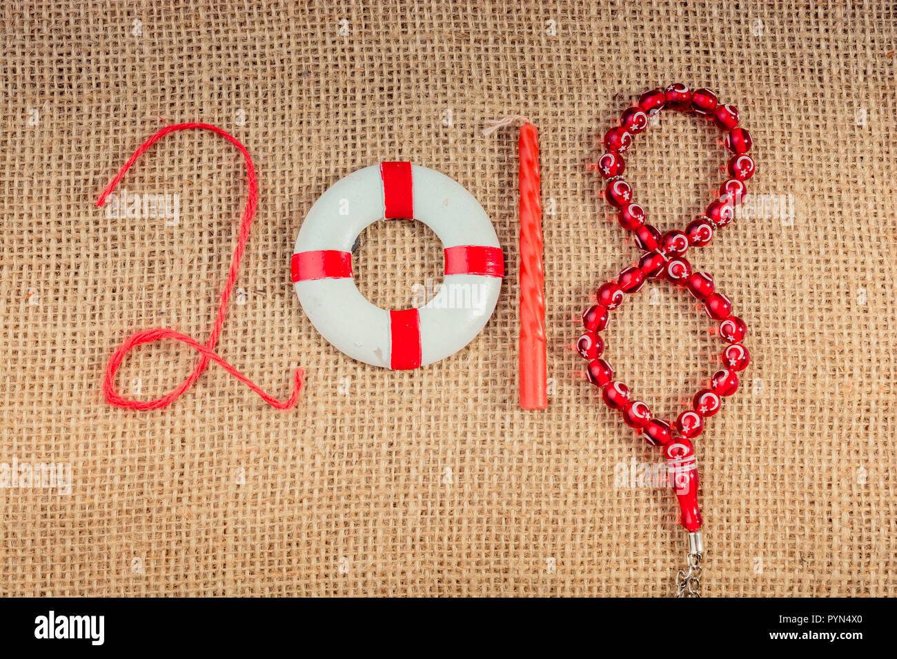 Happy Year 2018 Decoration With Life Preserver Candle And Beads