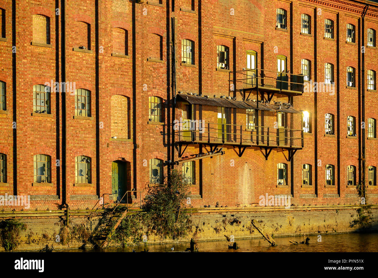 Whitworths Mill, a Victorian era building on the banks of the rIver