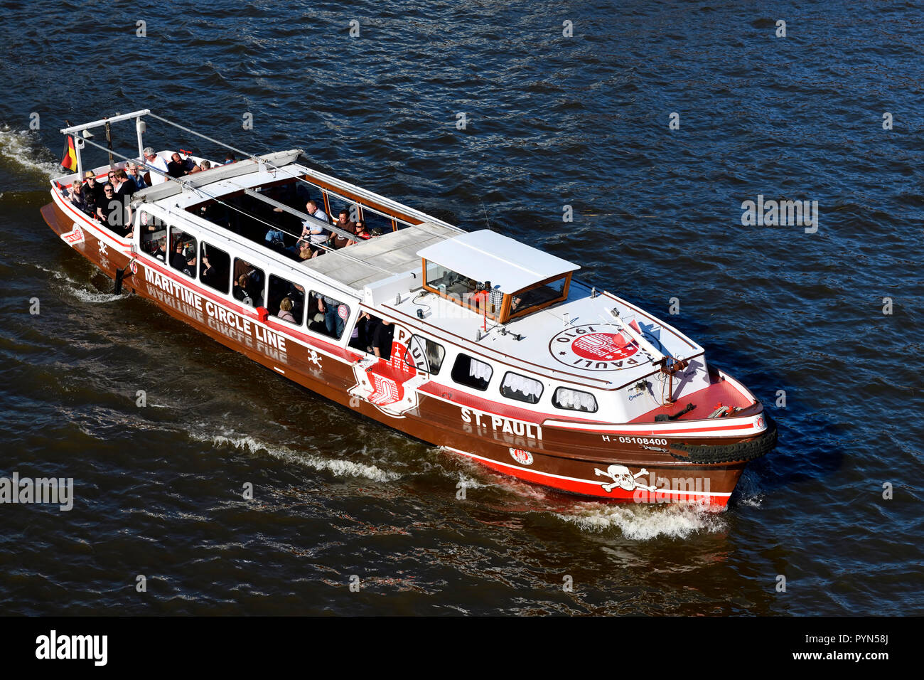 Longboat in the colours of the football association FC Saint Pauli on the Reiherstieg in Hamburg, Germany, Europe, Barkasse in den Farben des Fußballv Stock Photo