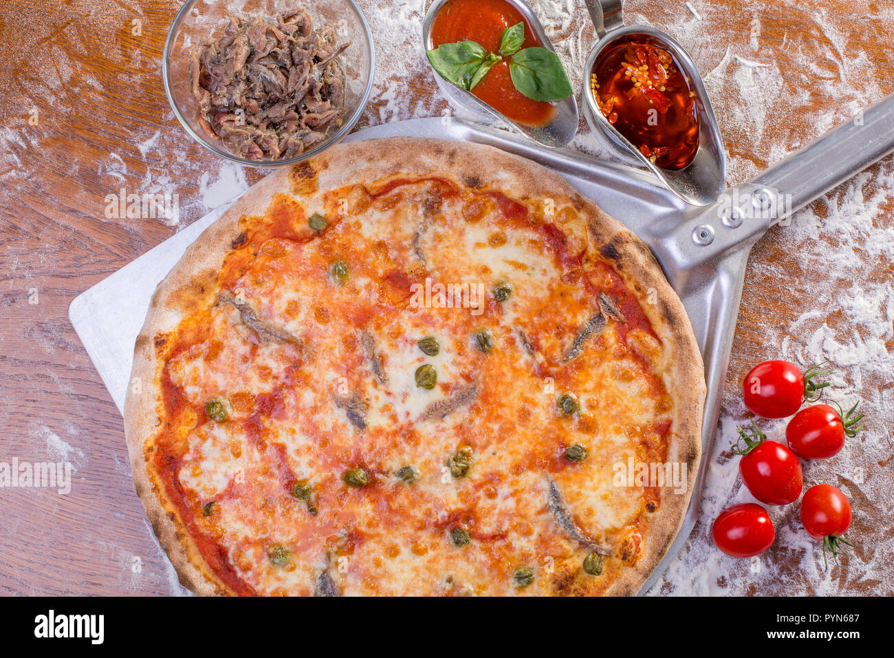 Pizza anchovies capers hires stock photography and images Alamy