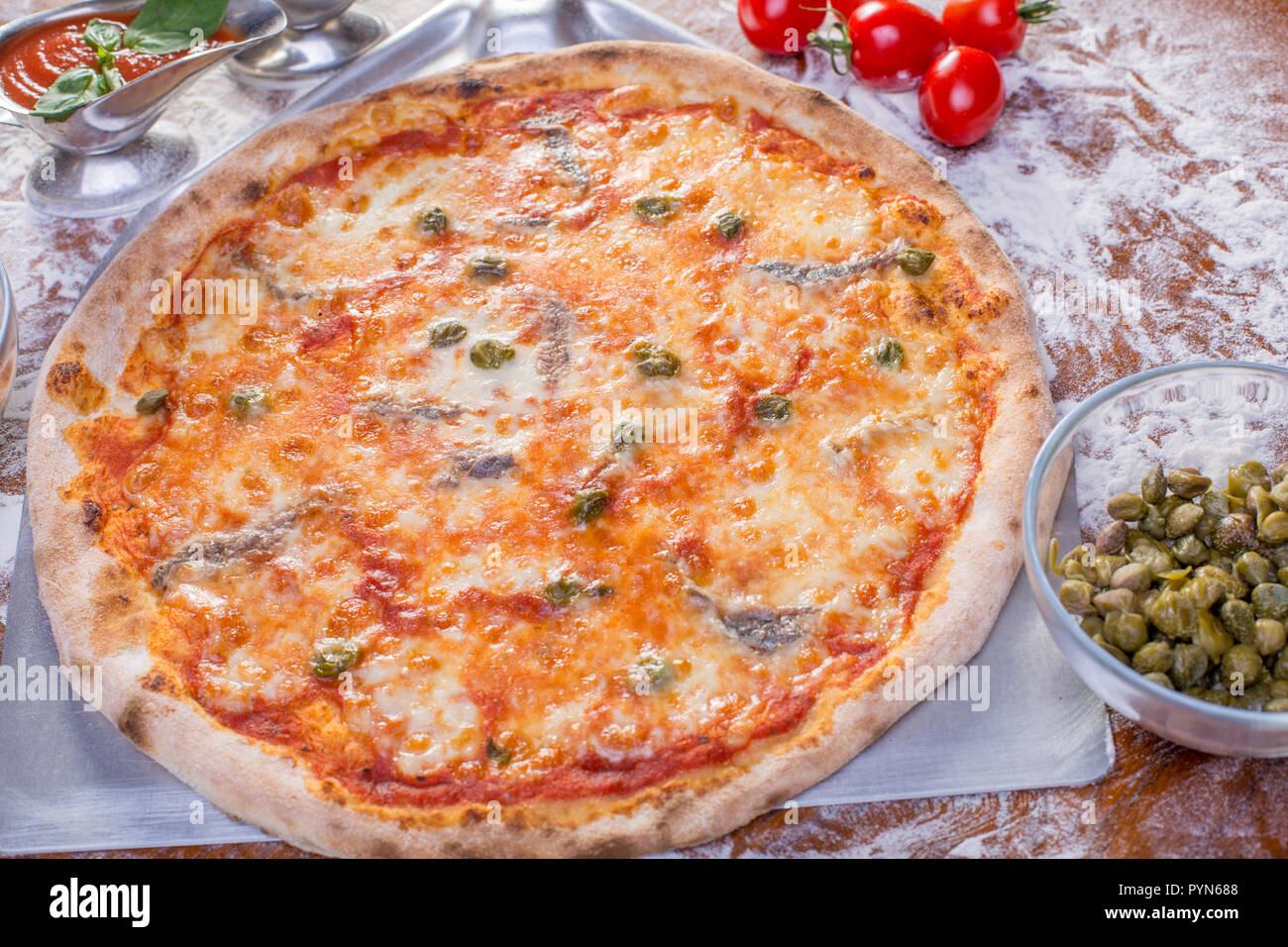 Pizza with anchovies and capers hires stock photography and images Alamy