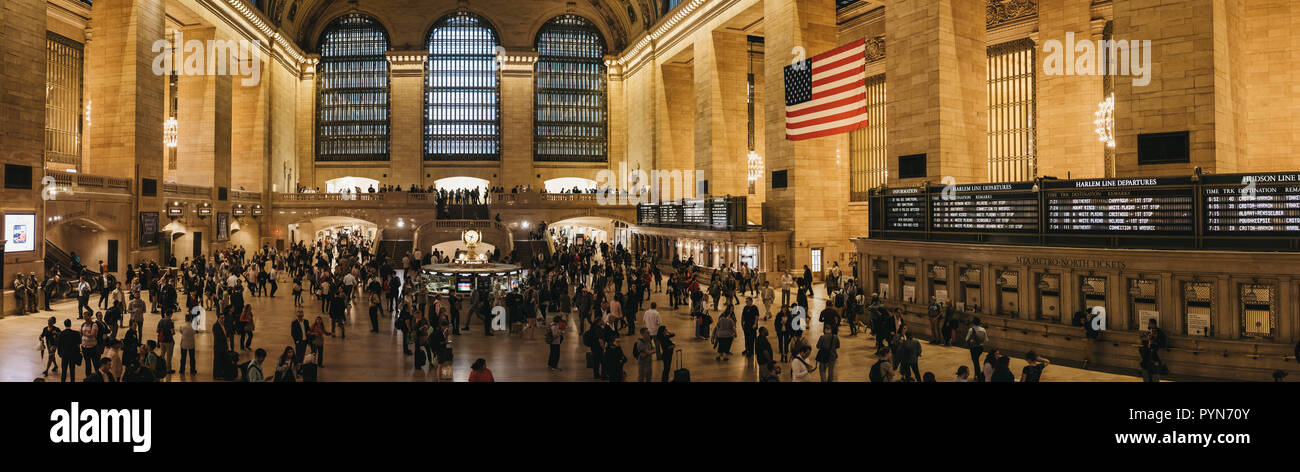New York, USA - May 31, 2018: Panoramic view of people walking inside Grand Central Terminal, a world-famous landmark and transportation hub in Midtow Stock Photo