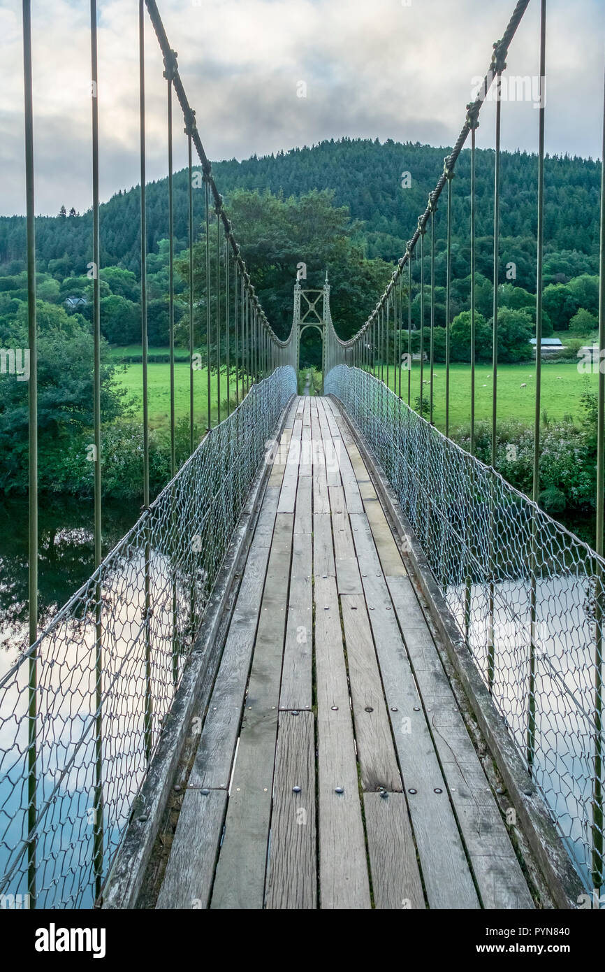 Sappers suspension bridge over the River Conwy built in 1930 and a prominent landmark in the village of Betws-y-Coed in North Wales Stock Photo