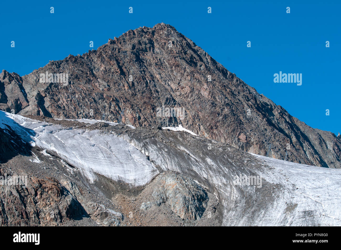 The Stubaier Wildspitze is a 3,341-metre-high mountain in the Stubai Alps in the Austrian state of Tyrol. Northeast of the summit lie two glaciers, th Stock Photo