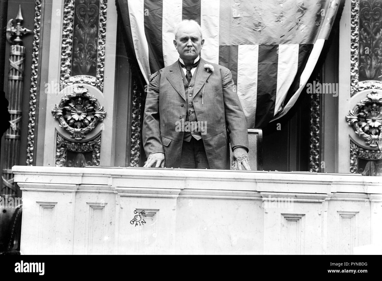 Photo shows Speaker of the House James Beauchamp 'Champ' Clark standing at the rostrum in the House of Representatives chamber, United States Capitol ca. 1911 Stock Photo