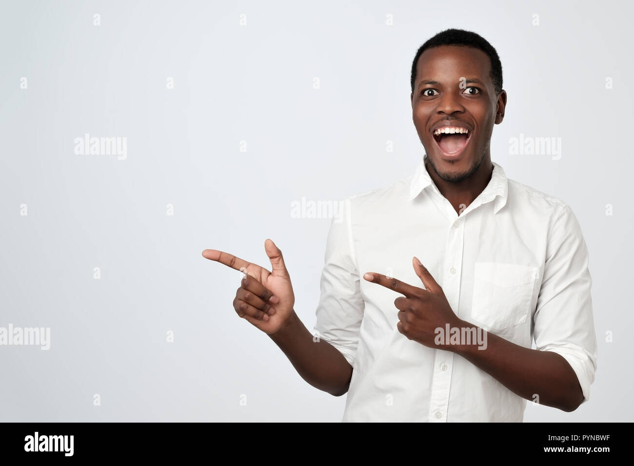 African young man standing hi-res stock photography and images - Alamy