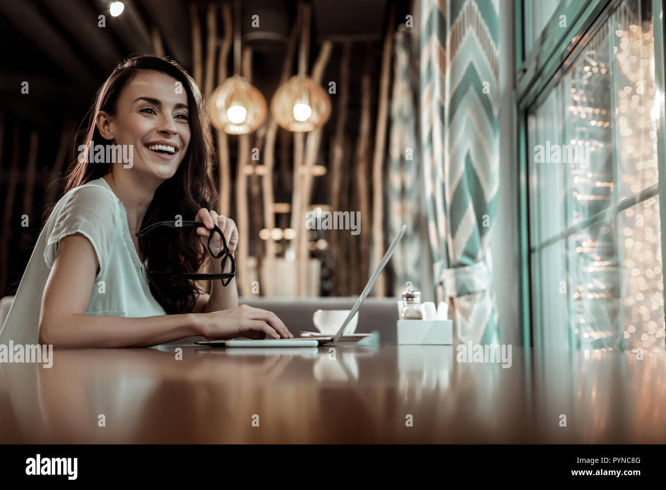 Happy female person creating successful business plan Stock Photo