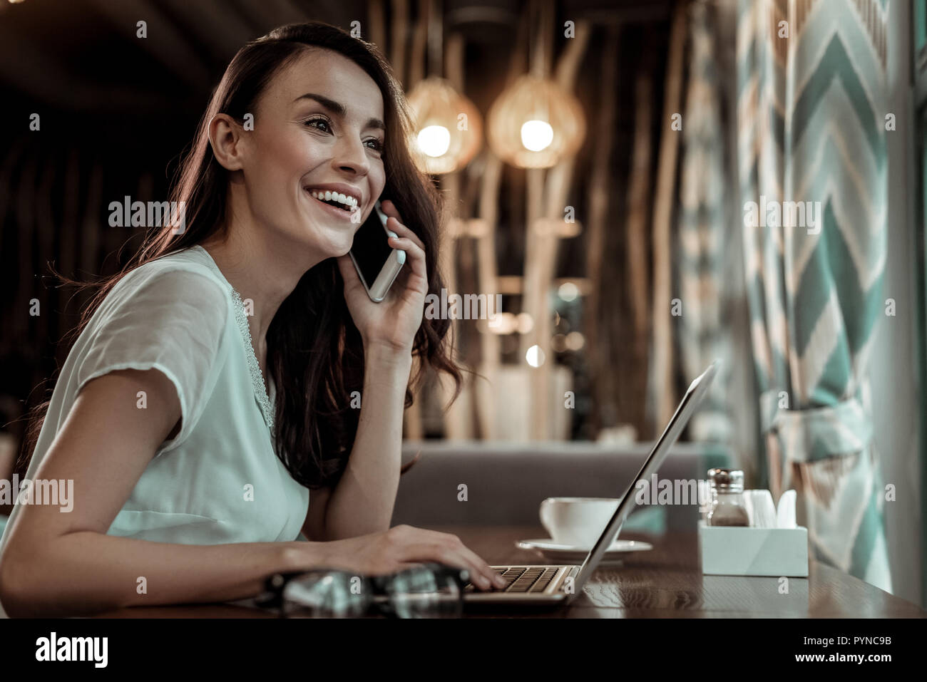Amazing girl talking per telephone with colleague Stock Photo