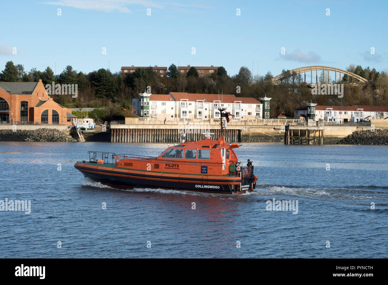 River Tyne pilot boat Collingwood with South Shields riverside in the background, north east England, UK Stock Photo