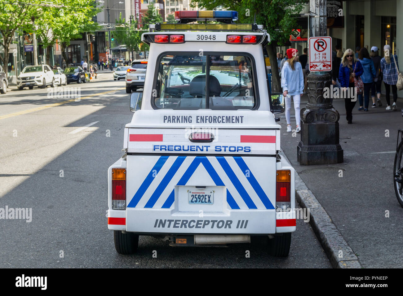Parking enforcement vehicle or car; Interceptor 3, downtown Seattle, WA, USA. Stock Photo