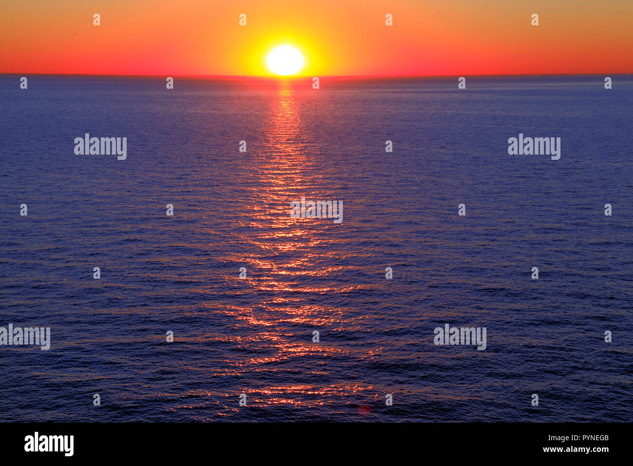 Sunset, sea, red sky, The Wash, North Sea, west facing coast, Hunstanton, Norfolk, UK, coasts Stock Photo