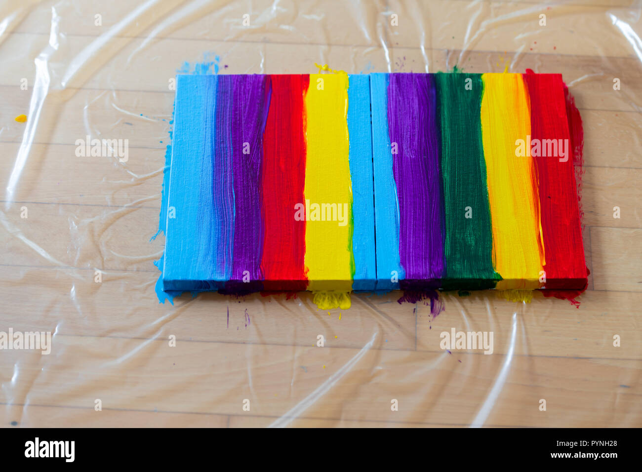 Rainbow on canvas painted with colorful pattern, nobody, close up, acrylic colors, DIY crafts Stock Photo