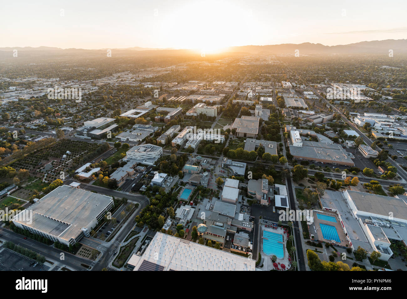Los Angeles, California, USA - October 21, 2018:  Sunset aerial view of California State University Northridge campus buildings in the San Fernando Va Stock Photo