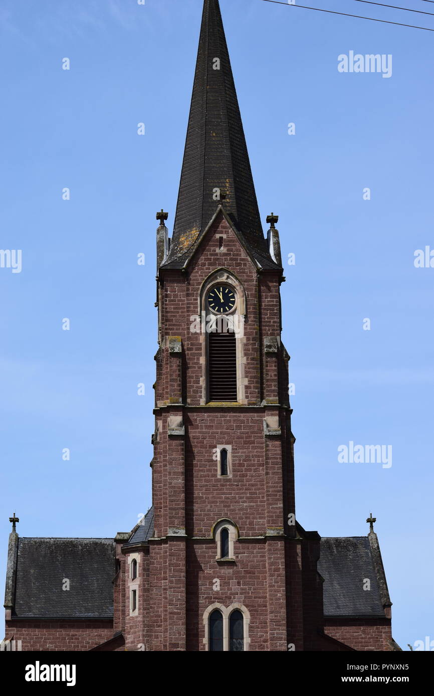 The Catholic Church St. Andreas built from 1898/1901, in Reimsbach view from the frontage, blue sky and sunny weather,  Ansicht von vorne Stock Photo