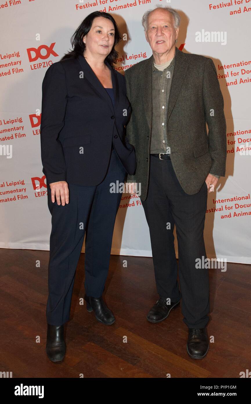 Leipzig, Germany. 29th Oct, 2018. Festival director Leena Pasanen and German director Werner Herzog in the CineStar cinema on the occasion of the opening of the 61st documentary film festival DOK Leipzig. The motto of the event will be "Demand the impossible!" and 306 films from 50 countries will be shown from 29 October to 04 November 2018. Credit: Sebastian Kahnert/dpa-Zentralbild/dpa/Alamy Live News Stock Photo
