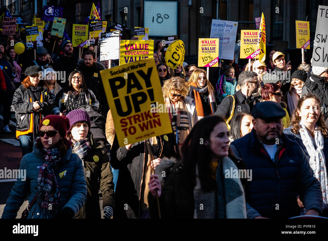 Protesters seen marching with placards. Thousands of education staff went on strike to demand a 10% increase in their wage. The march was organised by Educational Institute of Scotland or EIS, the oldest teaching trade union in the world. Stock Photo