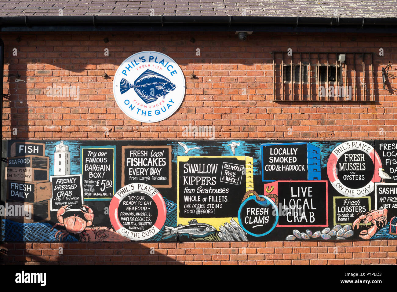 Advertising outside Phil's Plaice fishmongers on North Shields fish
