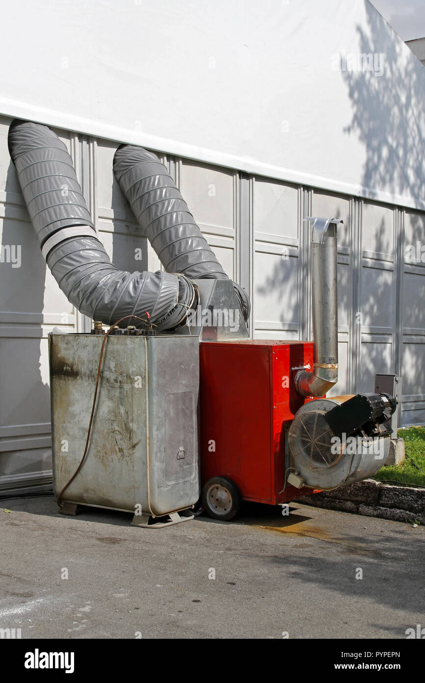 Industrial size air heater for big hall Stock Photo - Alamy