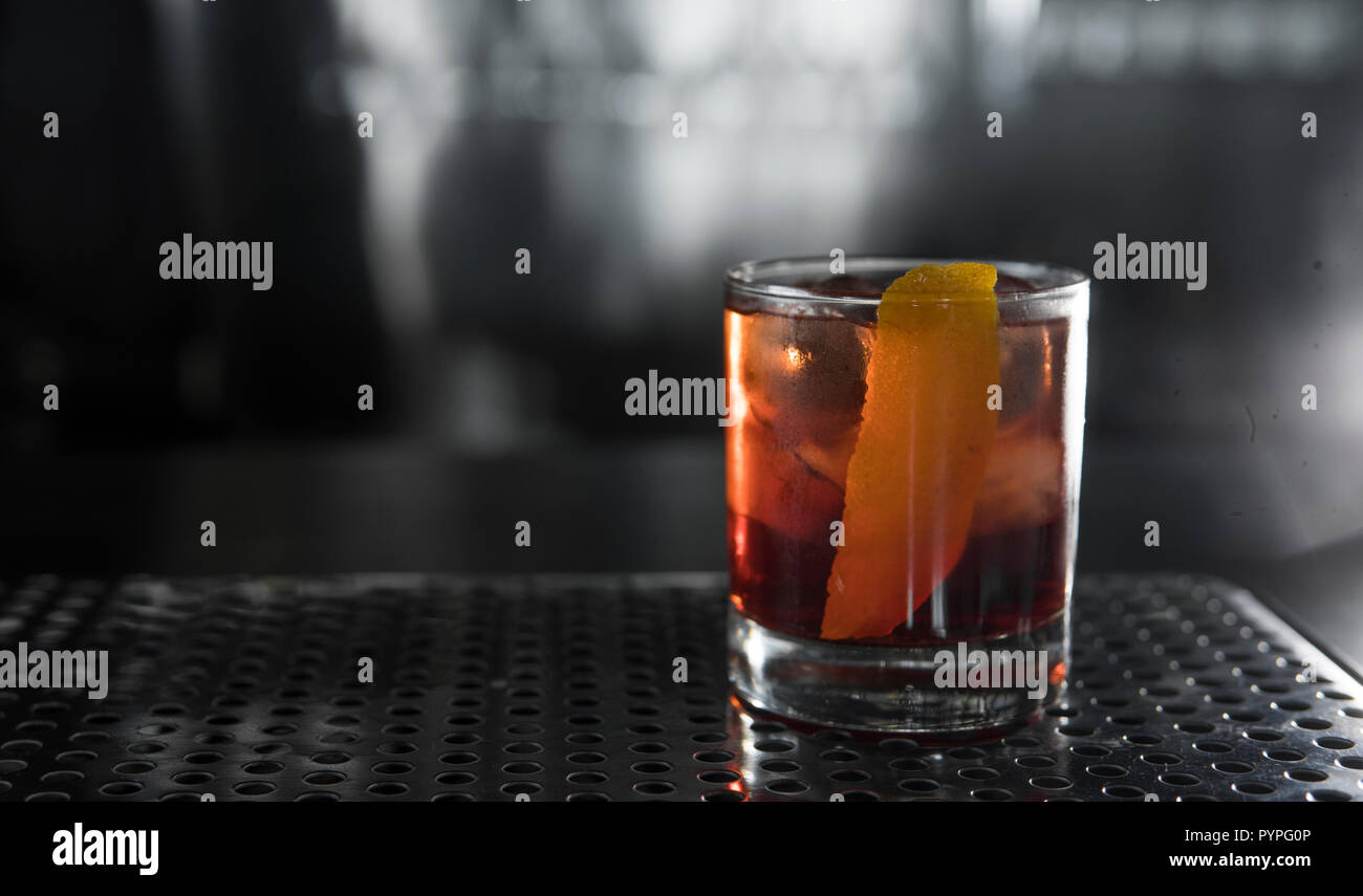 Classic cocktail Negroni with gin, campari and martini rosso