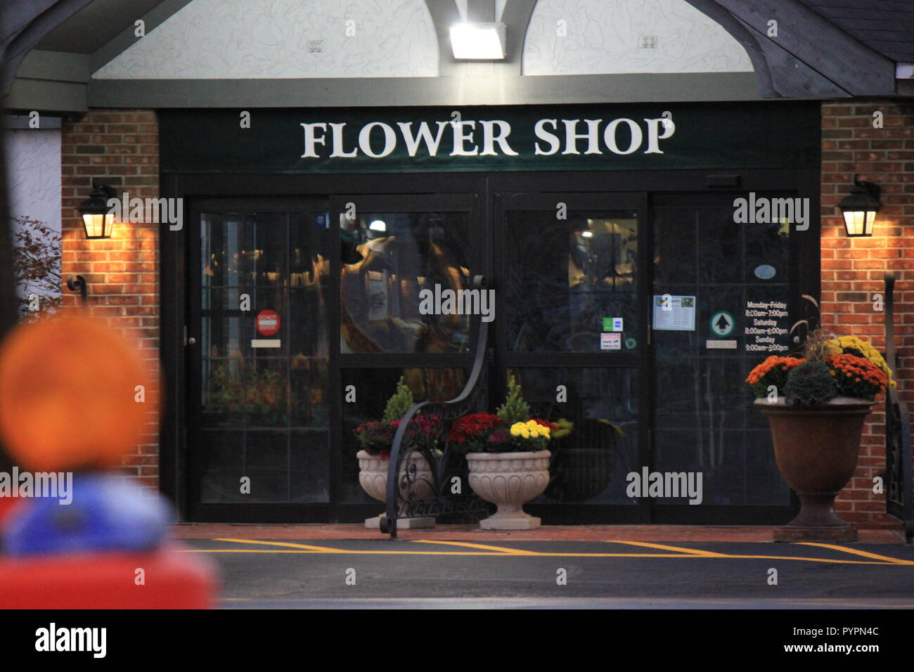 Charming Entrance to a fancy flower shop Stock Photo Alamy