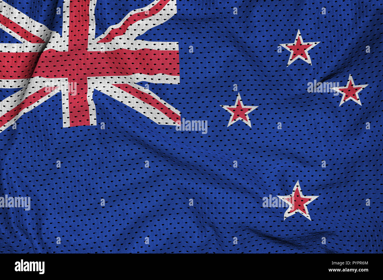 New Zealand flag printed on a polyester nylon sportswear mesh fabric with some folds Stock Photo