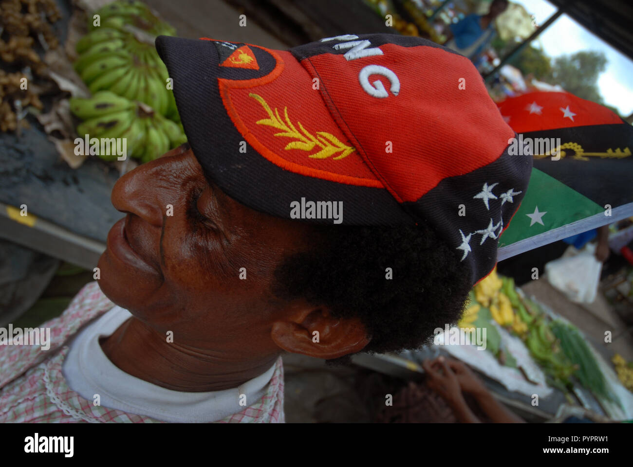 Lady wearing a PNG cap at Boroko market, Port Moresby, Papua New Guinea  Stock Photo - Alamy