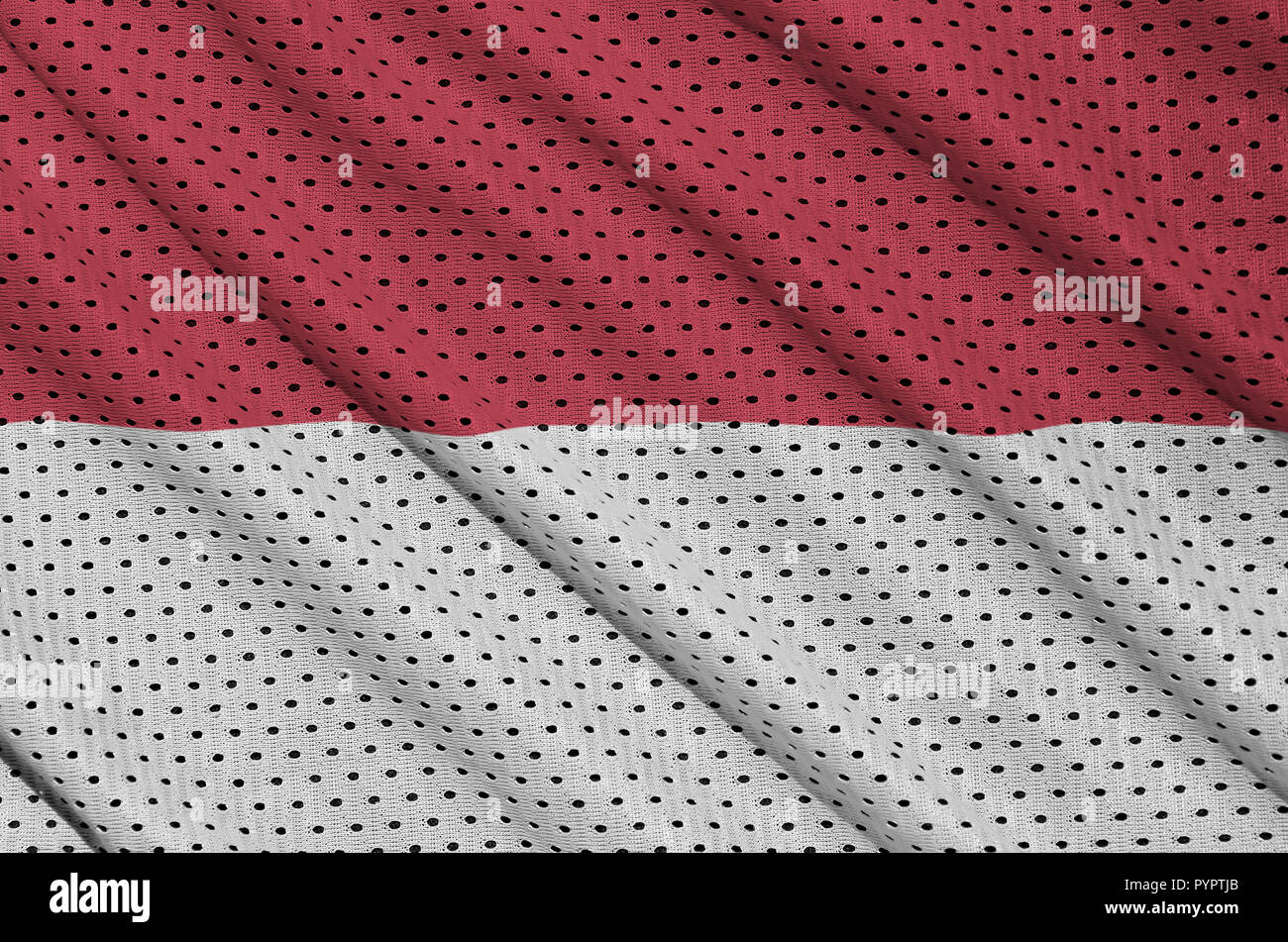 Indonesia flag printed on a polyester nylon sportswear mesh fabric with  some folds Stock Photo - Alamy