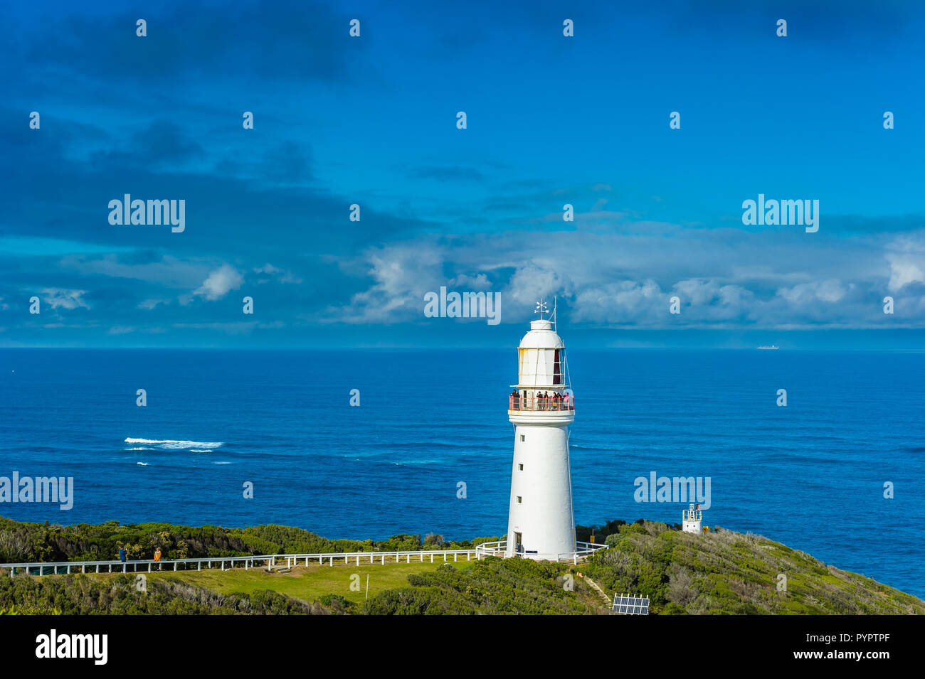 Beautiful and historical Cape Otway lighthouse and the Great Southern Ocean seascape on the Great Ocean Road. Stock Photo