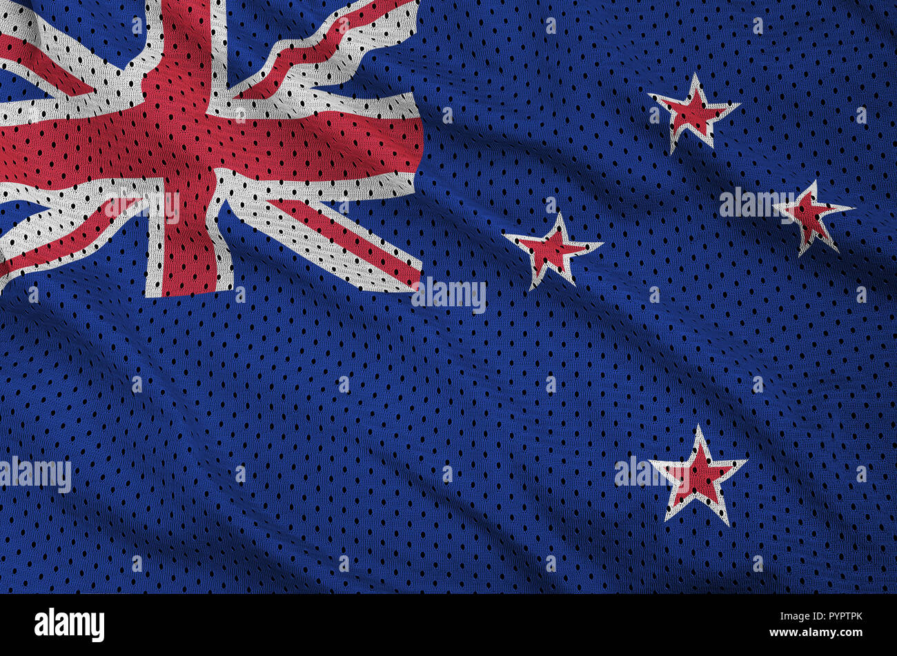 New Zealand flag printed on a polyester nylon sportswear mesh fabric with some folds Stock Photo