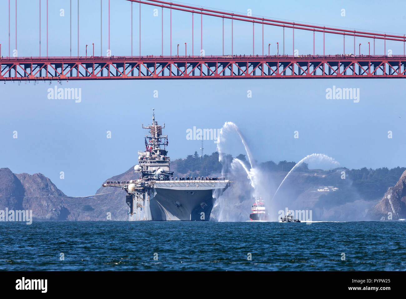 The Wasp Class Amphibious Assault Ship USS Bonhomme Richard (LHD-6) passes under the Golden Gate Bridge as it enters San Francisco Bay. The Bonhomme R Stock Photo