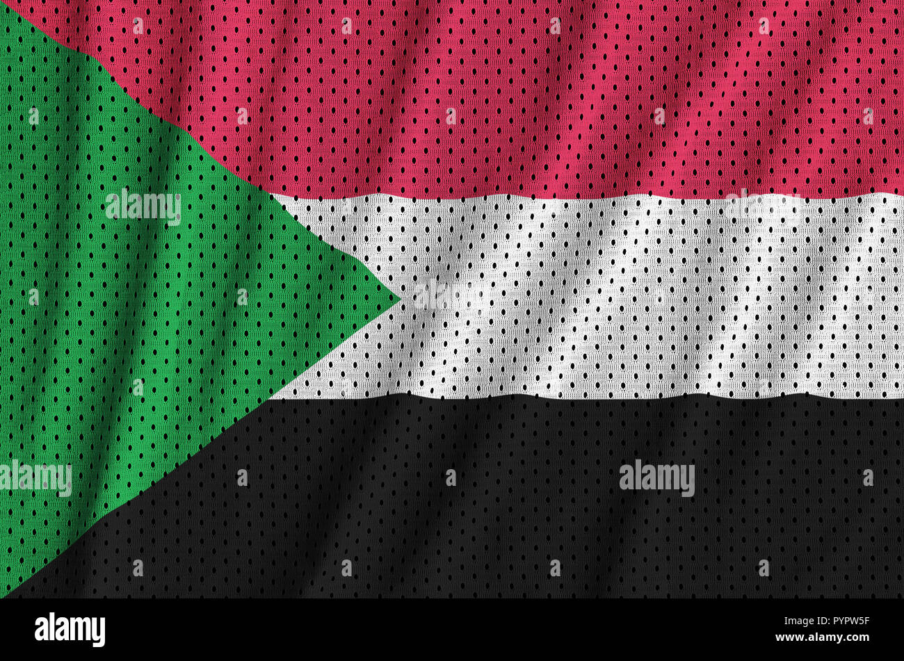 Sudan flag printed on a polyester nylon sportswear mesh fabric with some folds Stock Photo