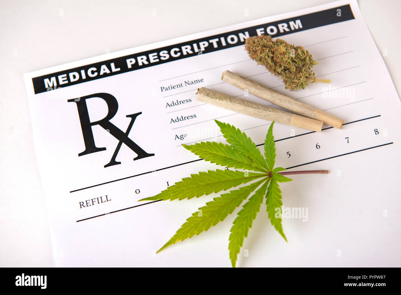 Cannabis background with leaf, pre rolls and cannabis nug over medical